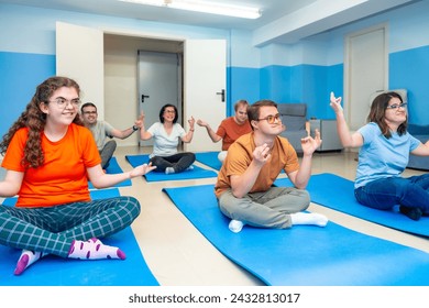 Disabled people enjoying practicing lotus pose during yoga class together - Powered by Shutterstock