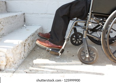 Disabled Person In Front Of The Stairs