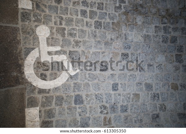 Disabled person\
sign drawn on the parking space.\
