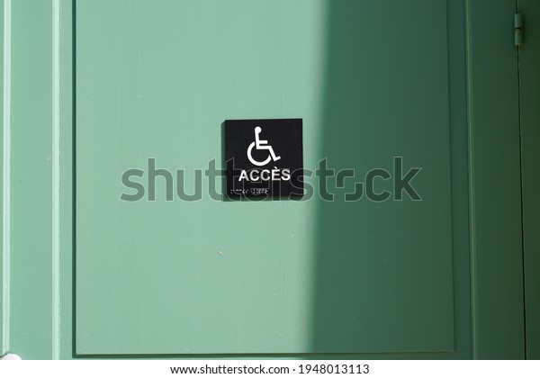 disabled sign logo on door entrance store access\
pictogram on street\
shop