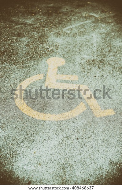disabled sign on\
asphalt\
