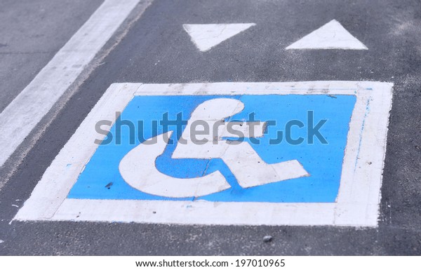 disabled sign on public city\
street