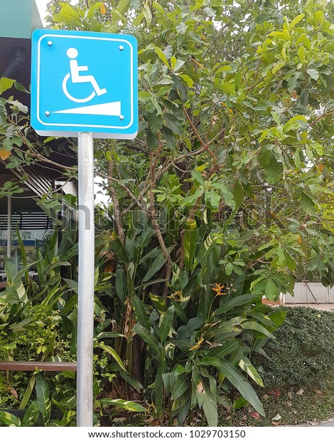 Disabled sign of wheelchair\
ramp.