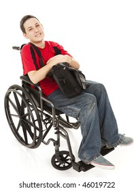 Disabled Teen Boy In His Wheelchair With His Backpack.  Full Body Isolated On White.