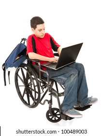 Disabled Teen Boy Using A Laptop Computer.  Full Body Isolated On White.