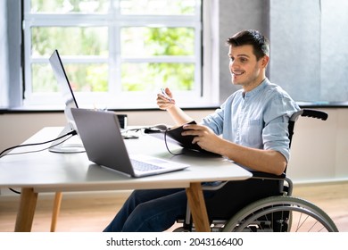 Disabled Virtual Assistant In Wheelchair Making Remote Video Call - Shutterstock ID 2043166400