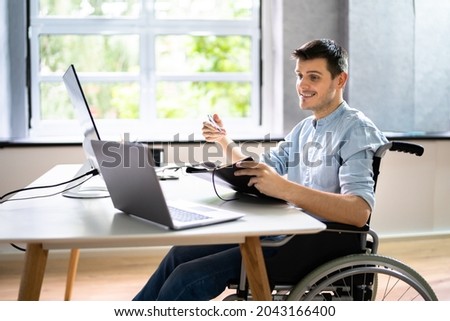 Disabled Virtual Assistant In Wheelchair Making Remote Video Call