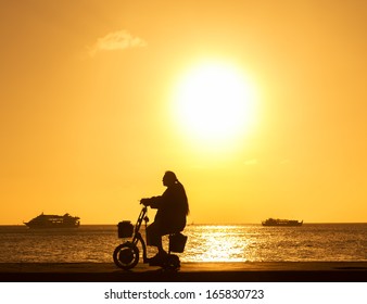 Disabled In A Wheel Chair. Silhouettes 