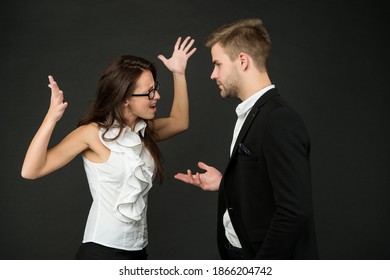 Disagreement Among Colleagues. Emotional Woman And Man Fight Dark Background. Professional Or Personal Conflict. Conflict Resolution And Professionalism In Workplace. Poor Business Communication.