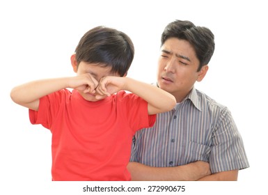 Disappointed Asian Child With Father