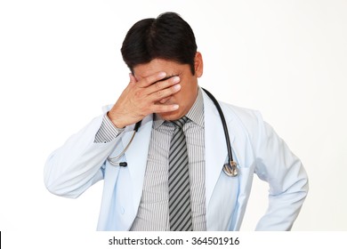 Disappointed Asian Doctor