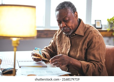 Disappointed Elderly Man Sitting On Couch In Living Room Feels Frustrated By Bad News, Reading Paper Postal Correspondence, Bank Notice About Debt, Notification Of Eviction, Negative Letter Concept