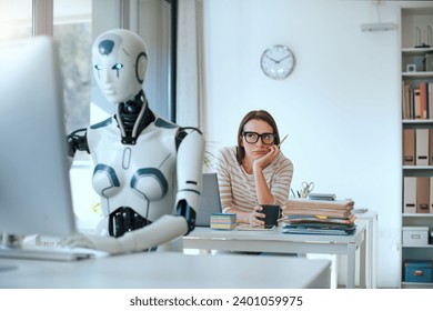 Disappointed stressed woman and AI robot sitting at the office desk and working - Powered by Shutterstock