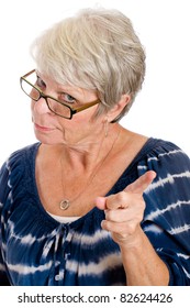 Disappointed woman showing her unhappiness by wagging her finger.