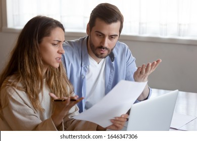 Disappointed Young Married Couple Manage Paperwork Household Bills Frustrated By Wrong Document, Confused Millennial Husband And Wife Shocked By Postal Correspondence Letter From Bank