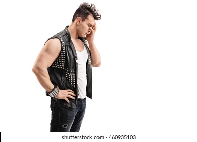 Disappointed Young Punk Rocker Holding His Head In Disbelief Isolated On White Background