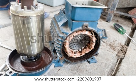 Disassemble three-phase electric motor, electric motor winding.