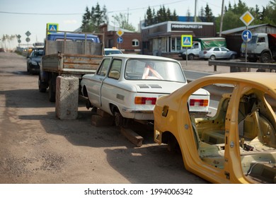 Disassembled Car Frame On The Street. Car After An Accident. Unsuitable Vehicle For Use. Damaged Machine Frame.