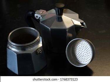 A Disassembled Moka Pot / Stove Top Coffee Maker