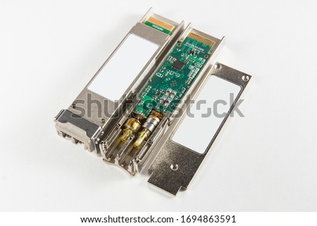 Disassembled XFP Optical Transceiver on white background