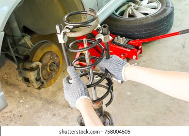 Disassembling Car Shock Absorber, Close Up.