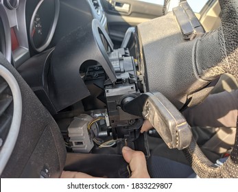 Disassembly Of The Steering Column To Replace The Contact Group Of The Ignition Switch. Part Of The Image Is Blurred.