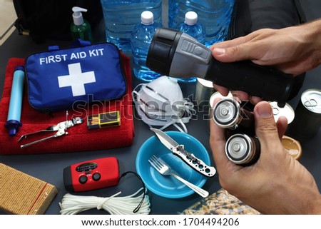 Disaster management includes preparing a disaster kit that can be contained in a go bag.These items should include a first aid kit,food,water,flashlight,radio,sleeping bag.Items that will help you.