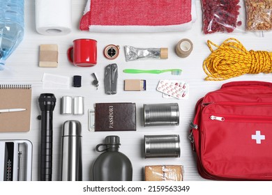 Disaster Supply Kit For Earthquake On White Wooden Table, Flat Lay