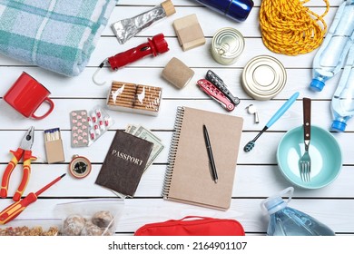 Disaster Supply Kit For Earthquake On White Wooden Table, Flat Lay