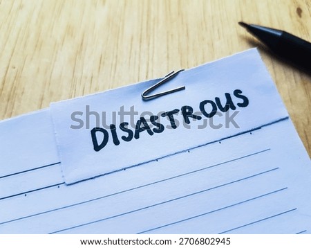 Disastrous writting on table background. 