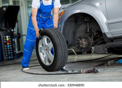 Disc Brake On Car In Process Of New Tire Replacement