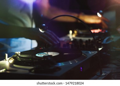 Disc Jockey In Action During 80's Vintage Party