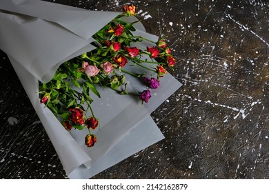 Discarded Bouquet Decorative Roses, Dried Flowers Concrete Floor