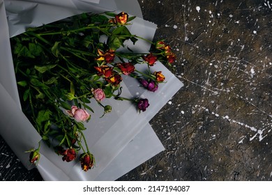 Discarded Bouquet Decorative Roses, Dried Flowers Concrete Floor