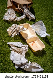 Discarded Fast Food Wrappers On Ground