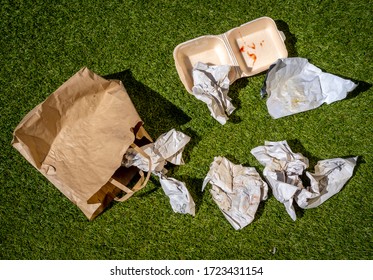 Discarded Fast Food Wrappers on Ground