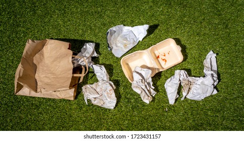 Discarded Fast Food Wrappers On Ground