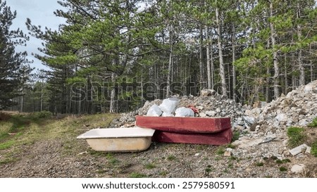 Similar – Image, Stock Photo Discarded mattress on the sidewalk in the light of a street lamp in front of an anonymous hotel façade