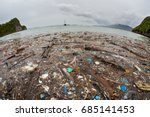 Discarded plastic has washed up near a remote island in Raja Ampat, Indonesia. Plastic is an ever-growing danger to marine ecosystems throughout the world.