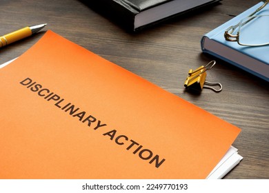 Disciplinary action documents for hr on the desk. - Shutterstock ID 2249770193