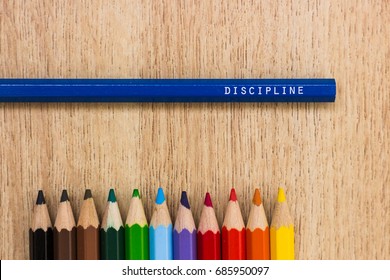 Discipline Word Written On A Colored Pencil. Education, School, Discipline Concepts