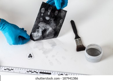 Disclosure Of Forensic Evidence Using Fingerprint Powders.