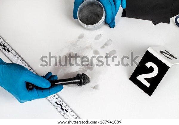 Disclosure of forensic evidence using\
fingerprint powders.