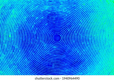 Disco background - concentric circles in blue. Textured background in the form of circles with a common center. Retro wallpaper.