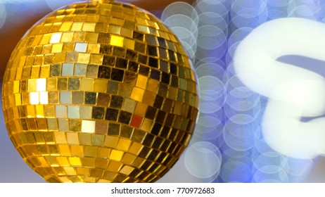 Disco ball is shiny in front of bokeh light decoration