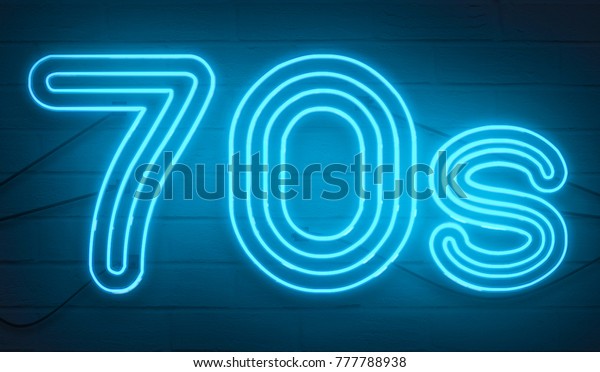 disco dance 70s\
neon sign lights logo text glowing color blue on dark black brick\
background, vintage style\
