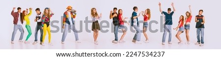 Disco party. Group of young, cheerful people wearing 80s, 90s fashion style clothes dancing isolated over grey background. Concept of youth, retro style, 90s era, fashion, lifestyle, ad. Banner