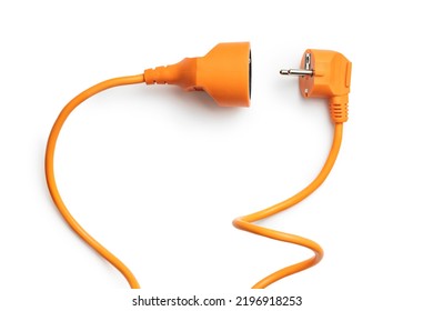 Disconnected orange electric plug and socket isolated on the white background. - Shutterstock ID 2196918253