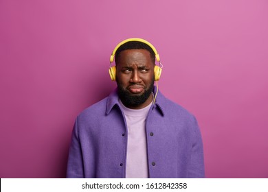 Photo Black Hipster Guy Concentrated Aside Stock Photo 1612849483 ...