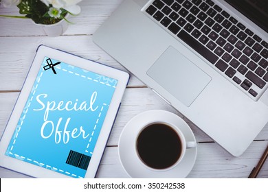 Discount Coupon Against Tablet On Desk